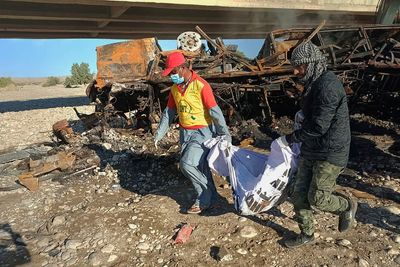 Passenger bus in Pakistan crashes, catches fire killing 40