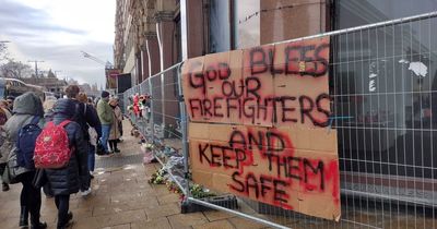 Devastated locals turn Edinburgh Jenners into shrine for fallen firefighter