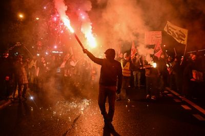 French PM says pension age hike 'non-negotiable' as strikes loom