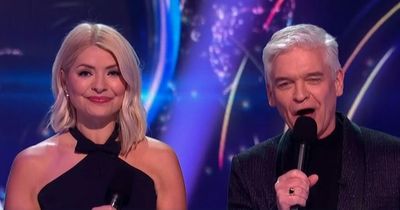 Dancing on Ice host Holly Willoughby shines in navy halter neck gown for musicals week
