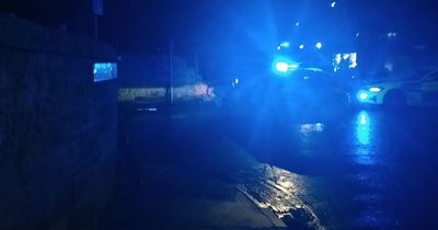 Edinburgh road locked down after car ploughs into wall as driver rushed to hospital