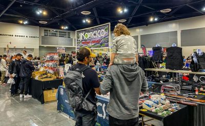 At California gun fair, few speak of recent massacres