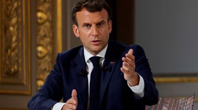 Macron Salutes Fight of 'Martyr' Mahsa Amini