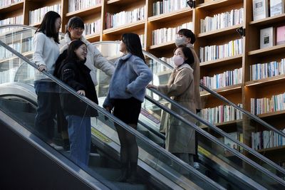 South Korea drops indoor anti-COVID mask mandate, infection fears linger