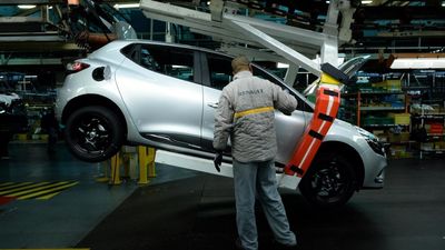 French carmaker Renault slashes stake in Japanese partner Nissan