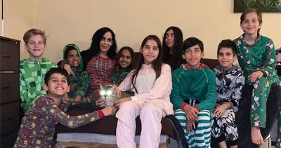 Mum who gave birth to octuplets defies critics as she celebrates kids' 14th birthday