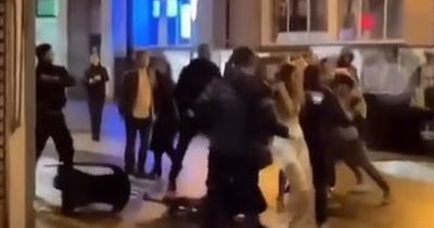 Groups fling chairs at each other's heads during city centre brawl