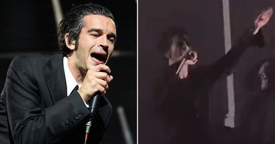 The 1975 star Matty Healy causes outrage after being accused of Nazi salute on stage