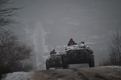 Ukraine news – live: Kyiv fighting ‘for every metre’ as France says it’s open to sending fighter jets