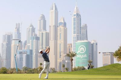 McIlroy comes through 'battle' to edge bitter rival Reed in Dubai