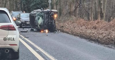 Car flips in horror crash on Scots road as man rushed to hospital