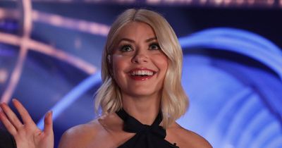Holly Willoughby 'flees Dancing On Ice studio in curlers after fire alert evacuates cast'
