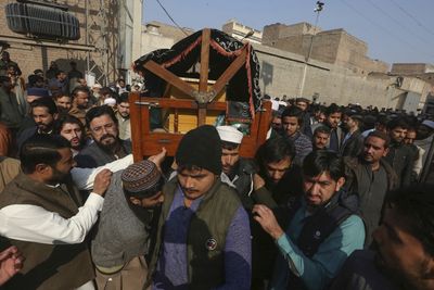 Death toll from Pakistan mosque bombing rises to 100