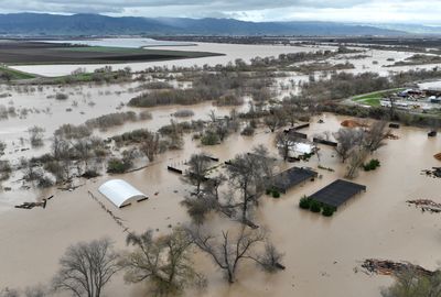 Calif. plans climate cuts despite floods