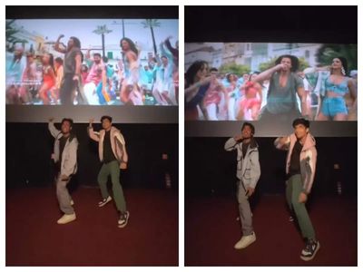 You just can't miss this video of two Shah Rukh Khan fans matching steps on 'Jhoome Jo Pathaan' in a crowded theatre -WATCH