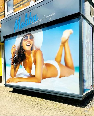 Tanning salon ordered to remove ‘offensive’ window display