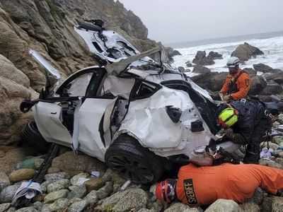 The driver of a car that plunged off a California cliff charged with attempted murder