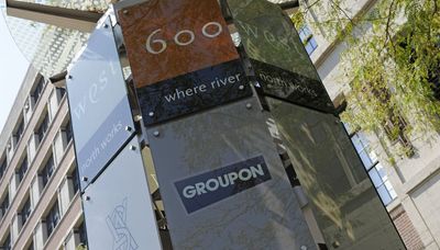 Groupon orders more layoffs as it reorganizes