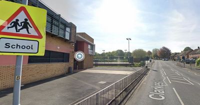 Boy, 15, stabbed outside school in broad daylight with knife attacker still at large