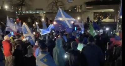Hundreds gather at Edinburgh’s Holyrood Park in torchlit anti-Brexit protest
