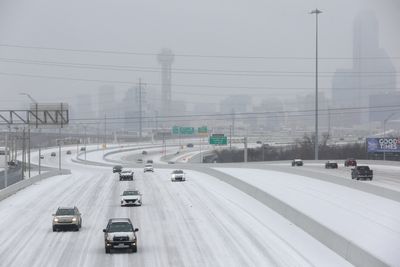 Winter chill brings power outages and travel issues to US south