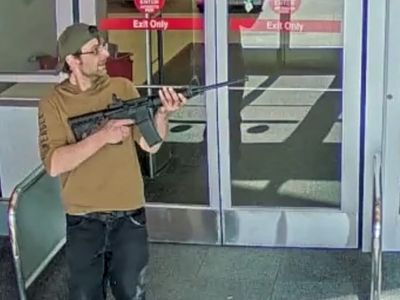 Chilling photo of heavily armed gunman who opened fire in Target store