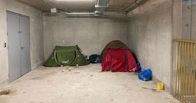 Homeless people have pitched tents in the Swansea Arena car park and the council is trying to help them
