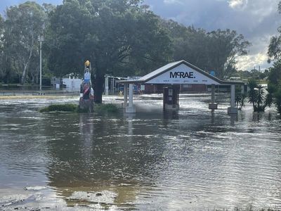 Floods and player shortage threaten historic footy club