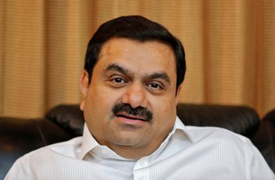 Exclusive-Indian market regulator examining Adani share rout, source says