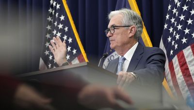 Fed hikes key interest rate by quarter-point, signals more ahead