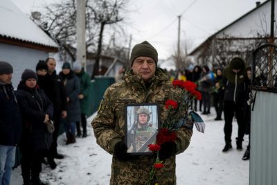 Ukraine mourns athlete-soldier amid opposition to Russians at Olympics