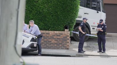 Brisbane man critical after being stabbed in chest, locked on balcony, police say