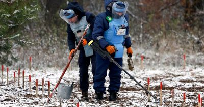 Ukrainian civilians 'forced to cross MINEFIELDS to find safe path' by Russian army