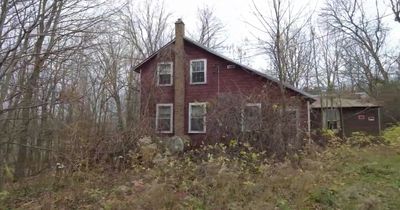 Spooky abandoned house in woods left full of creepy dolls and forgotten dentures