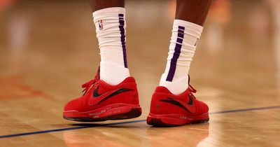 LeBron James wears special edition Liverpool Nike trainers during LA Lakers NBA game