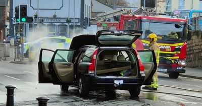 Two men seen 'jumping out' of burning car in Old Swan