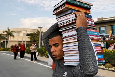 Egyptians hope to bag bargains at book fair as crisis bites