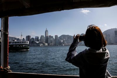 China to fully reopen borders with Hong Kong, Macau
