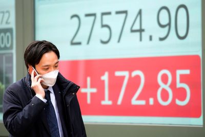 Asian shares trade mixed ahead of US jobs report