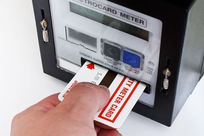 How do prepayment energy meters work and what is being done to stop people being cut off?