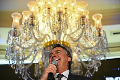 From presidential palace to KFC: Bolsonaro's peculiar exile in US