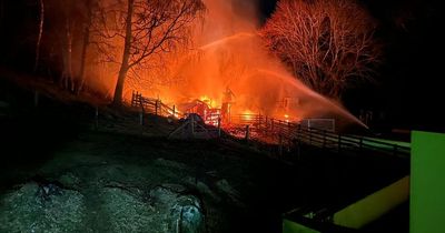Fire crews battle to quell huge gas cylinder barn blaze in rural Scots village