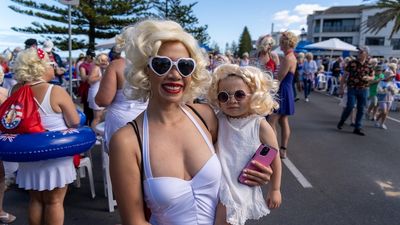 Hundreds of Marilyn Monroe look-alikes take the plunge at Brighton for annual cancer fundraiser