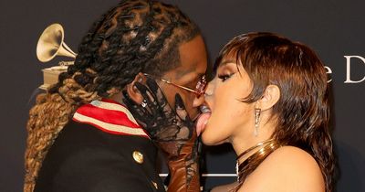 Cardi B licks husband Offset's face as they put on steamy display at pre-Grammys party