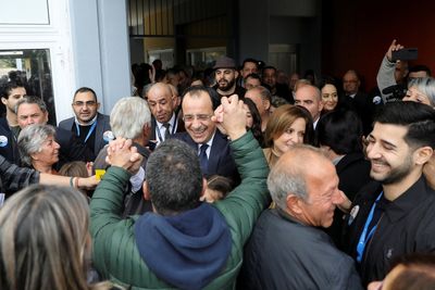 Former foreign minister holds lead in Cyprus vote, runoff on Feb 12