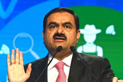 Adani shares dive again as Indian opposition stages demos