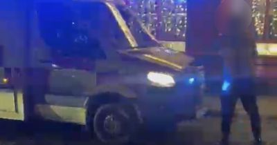 Woman shocked after allegedly being 'thrown against taxi' after filming men blocking ambulance in Dublin
