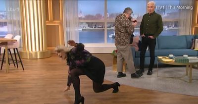 This Morning's Phillip Schofield watches on in horror as Holly Willoughby falls