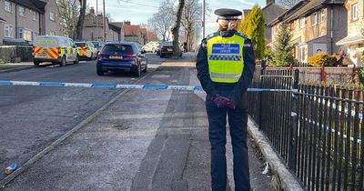 Three children 'aged under seven' and woman 'stabbed' in house