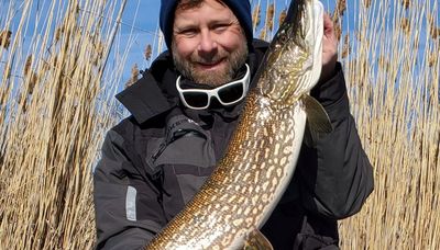 A day ice fishing pays off with a trophy ‘gator’